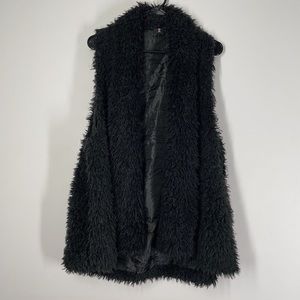 Black shaggy vest
